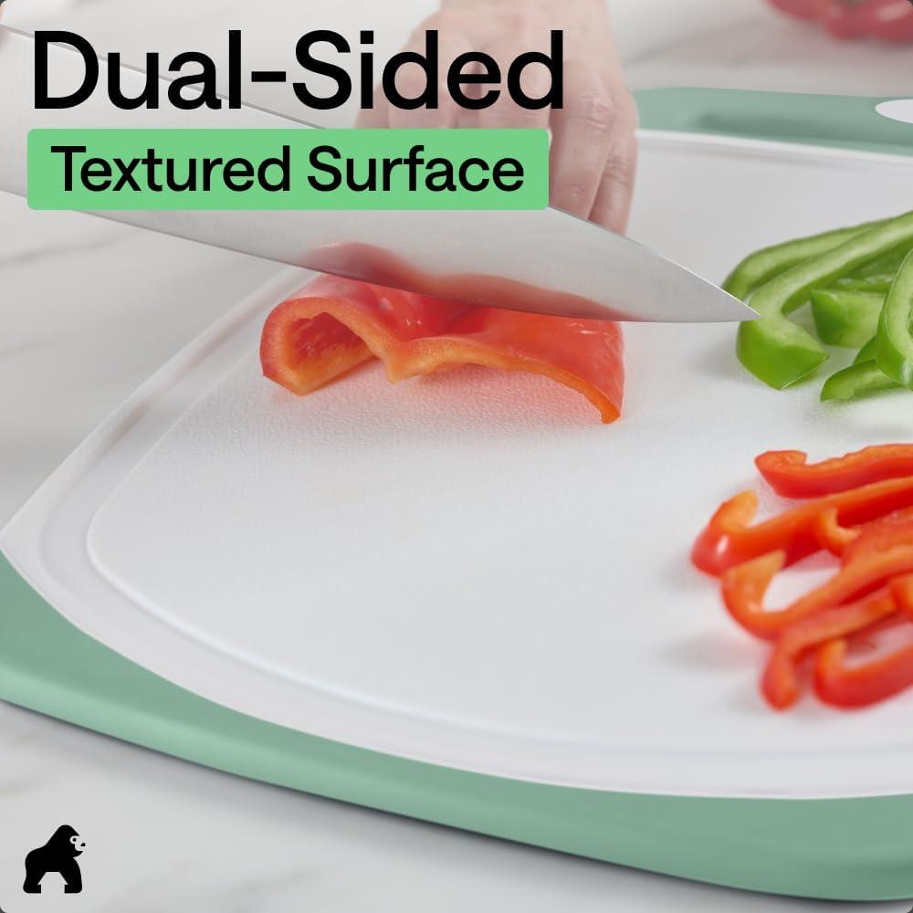 imageGORILLA GRIP BPAFree Reversible Kitchen Cutting Board Set of 3 US Designed Nonporous Juice Grooves Catch Liquid Slip Resistant Border Dishwasher Safe Durable Large Food Chopping Boards BlackGrayMintLight Pink