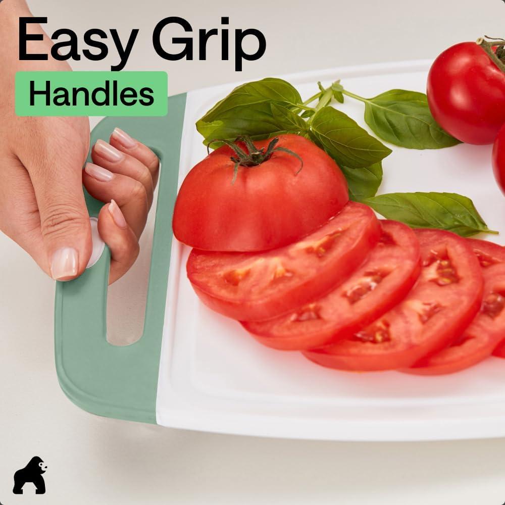 imageGORILLA GRIP BPAFree Reversible Kitchen Cutting Board Set of 3 US Designed Nonporous Juice Grooves Catch Liquid Slip Resistant Border Dishwasher Safe Durable Large Food Chopping Boards BlackGrayMintLight Pink