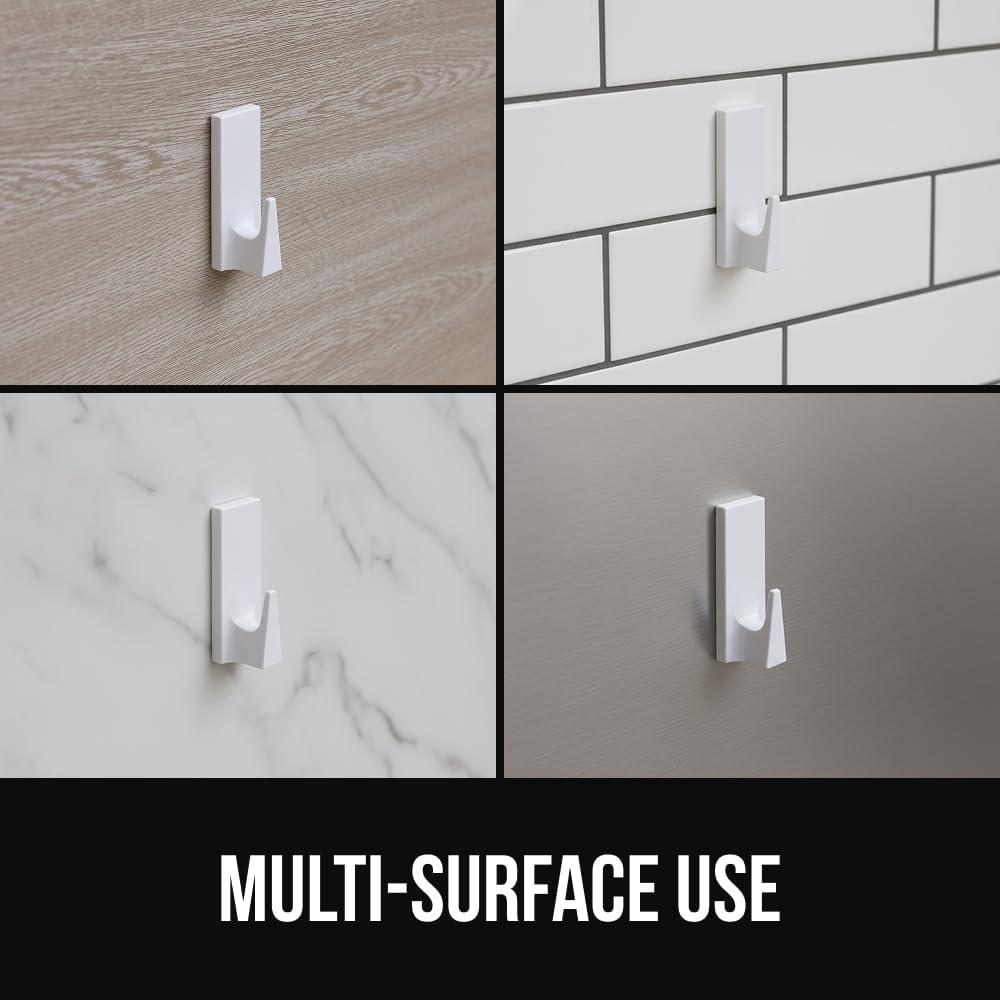 imageGORILLA GRIP Heavy Duty Reusable Wall Hooks for Hanging Strong Easy Install Stick on Removable Adhesive Hook No Nail Damage Multisurface Use for Christmas Decorations 5 Pack and 7 Strips PlasticWhite