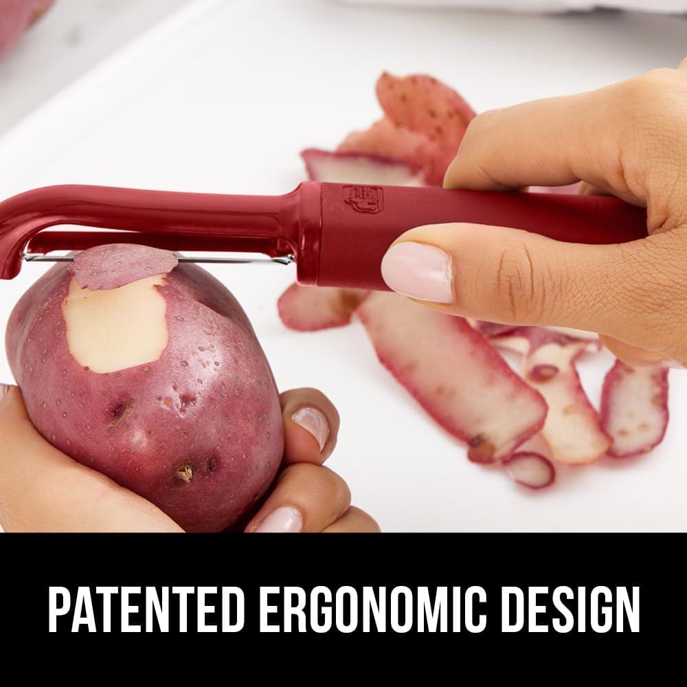 imageGORILLA GRIP Patented BPAFree Sharp Stainless Steel Dual Swivel Vegetable Peeler Soft Comfortable Handle Smoothly Peel Apples Potatoes Carrots Includes Blade Cover Holiday Prep Essentials BlackRed