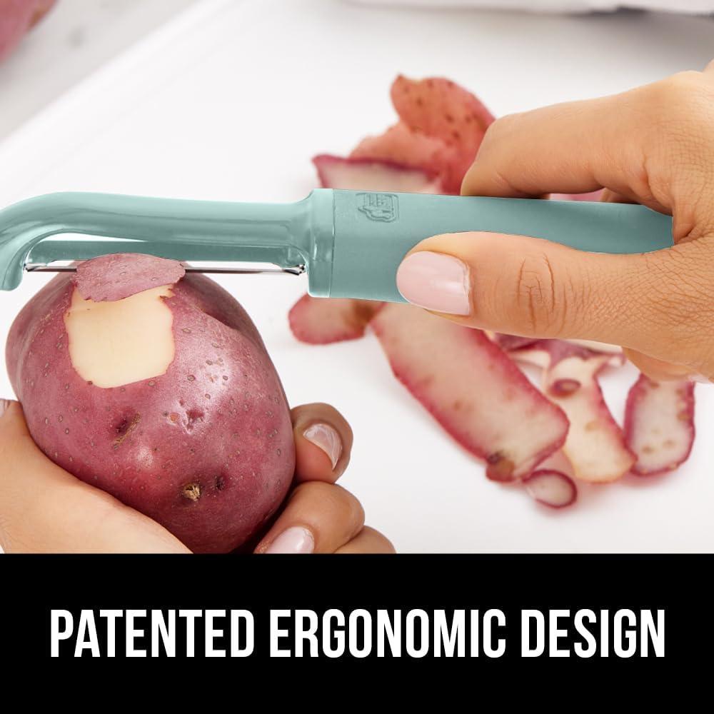 imageGORILLA GRIP Patented BPAFree Sharp Stainless Steel Dual Swivel Vegetable Peeler Soft Comfortable Handle Smoothly Peel Apples Potatoes Carrots Includes Blade Cover Holiday Prep Essentials BlackMint