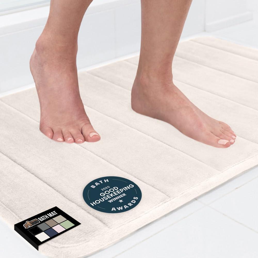 imageGORILLA GRIP Memory Foam Bath Mat Soft Absorbent US Designed Bathroom Rug Gripping Dots Machine Washable Bathmat Cushioned Floor Mats Shower Sink Rugs Room Dcor Accessories 24x17 Graphite GrayStriped Cream