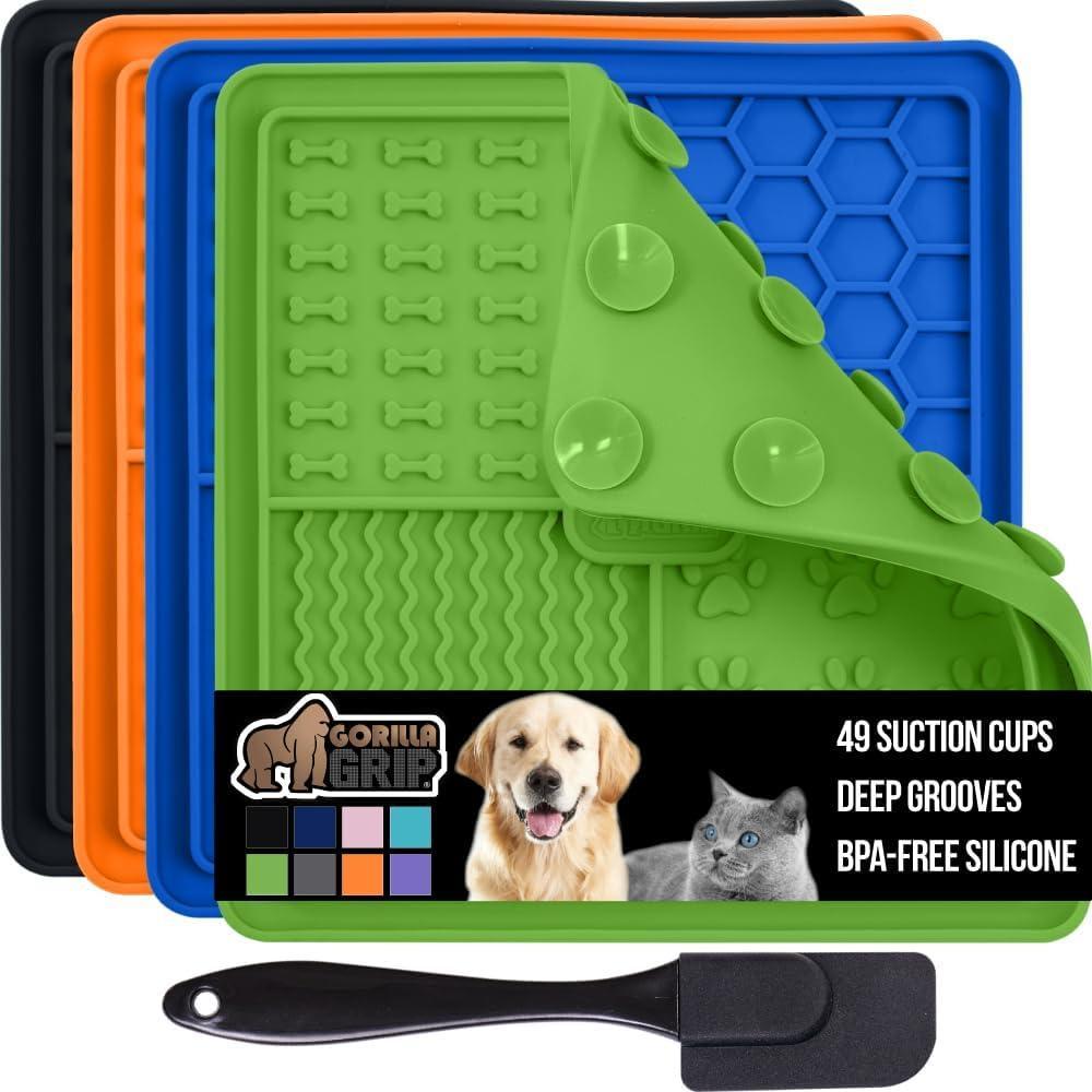imageGORILLA GRIP BPA Free Silicone Lick Mat for Dogs 49 Powerful Grip Suction Cups Dishwasher and Freezer Safe Flexible Licking Pad for Dog Baths Cat Grooming Nail Trimming Orange Purple 2 Pack BlackGreenOrangeRoyal Blue